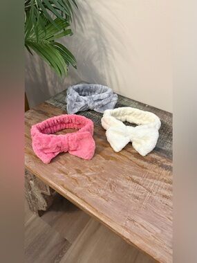 3 pack Spa Bow Headbands. Pink, gray and white. New in packaging
